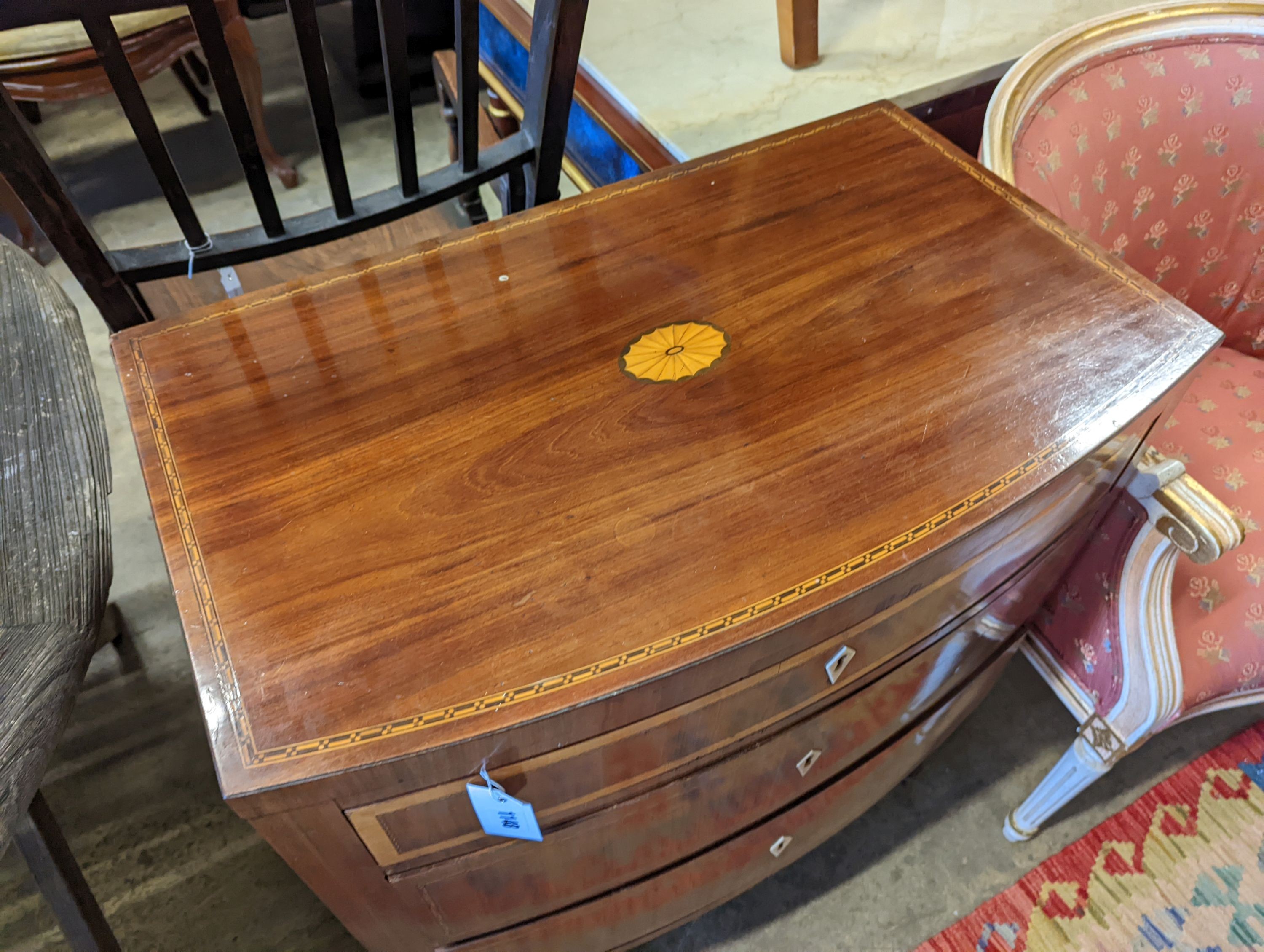 A Danish inlaid mahogany bow front chest, width 70cm, depth 44cm, height 82cm